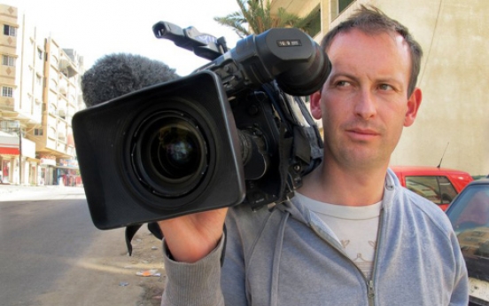 French journalist killed in Syria on official trip