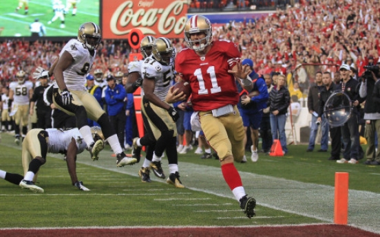 Smith, 49ers rally twice to stun Saints