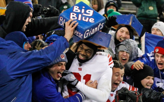 Eli, Giants stun Packers 37-20