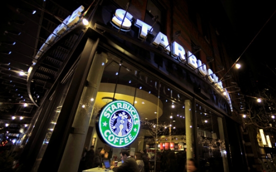 Starbucks to add wine at more cafes to lure evening diners