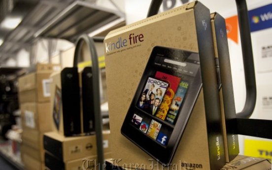 Amazon profit falls 57% on shipping costs, Kindle Fire