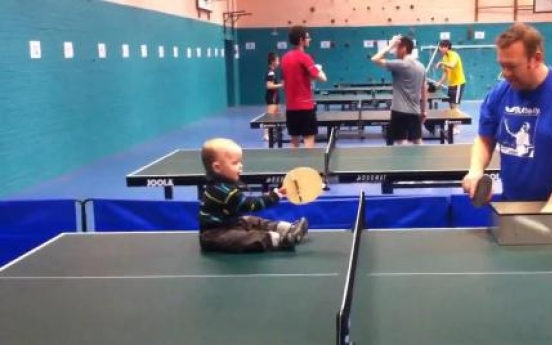 Video of a toddler playing ping-pong wildly popular on-line