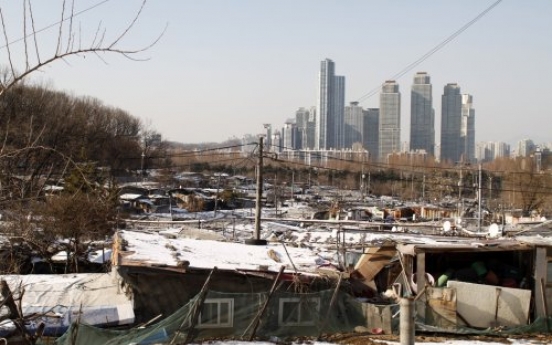 Coals to keep Guryong shantytown warm