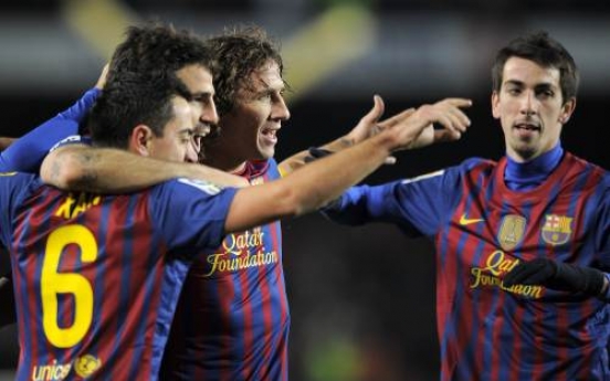 Barca beats Valencia to advance to final