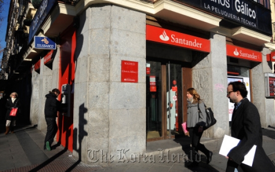 Fitch, S&P downgrade Spanish banks