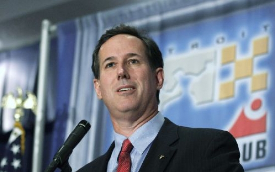 Santorum challenges Romney in Detroit