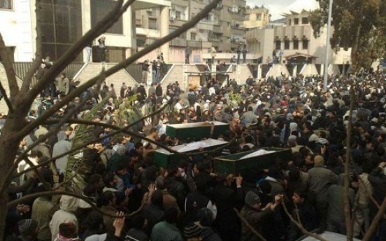 Syrian forces fire on funeral in Damascus