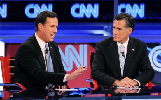 Romney pounces on Santorum in 20th debate