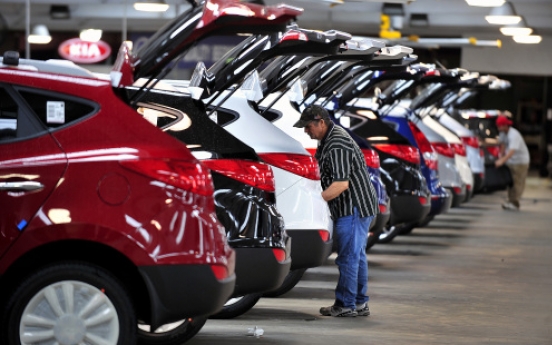 Detroit automakers race to keep up with sales