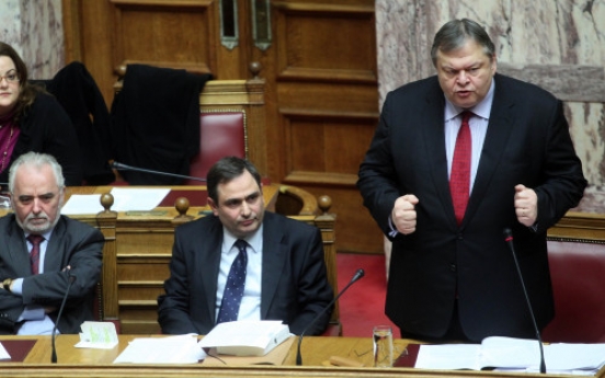 Greece approves more budget cuts for bailout