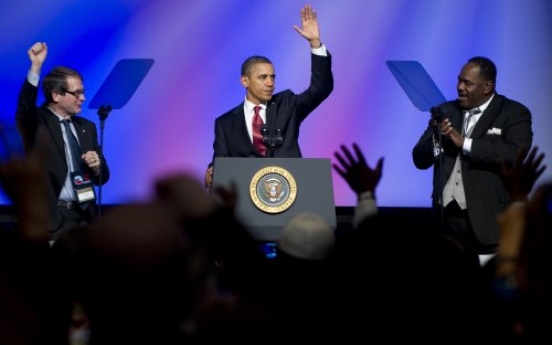 Punchy Obama hits Republicans over auto bailout