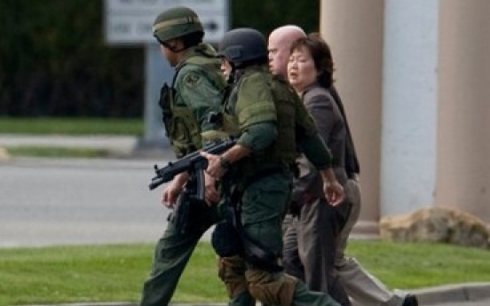 U.S. Police wound hostage-taker at Korean bank