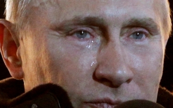 A tearful Putin claims Russian election victory