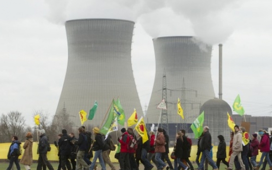 Protesters link arms around the world against nuclear