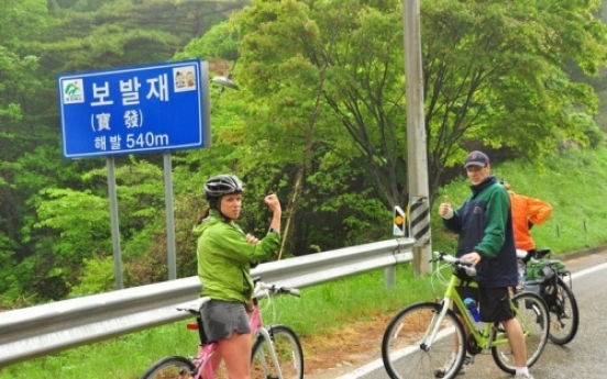 Biking the Balkans to give N.K. kids bread