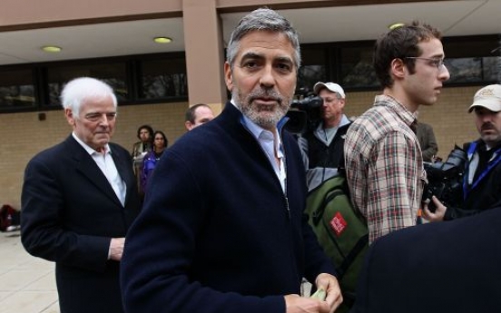 Clooney arrested in protest