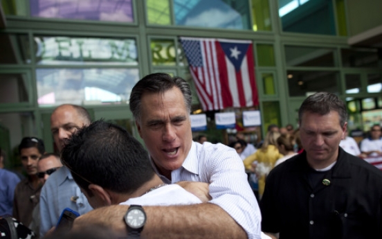 Romney looks to extend lead with Illinois win