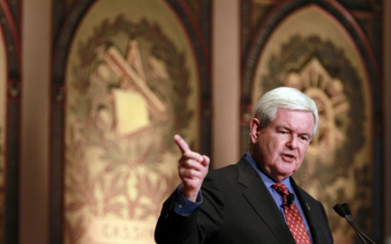 Gingrich scales back presidential campaign