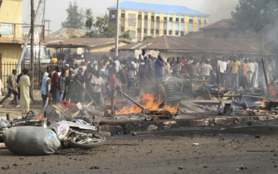 Car bomb near Nigeria churches kills 38