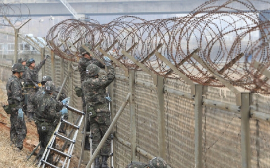 Military begins removing river fences