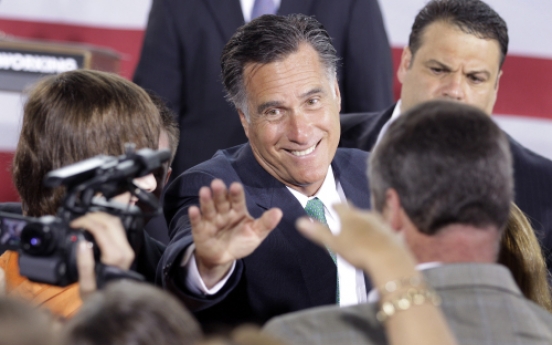 Romney, Obama battle over economy