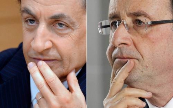 Hollande, Sarkozy heading to French vote runoff