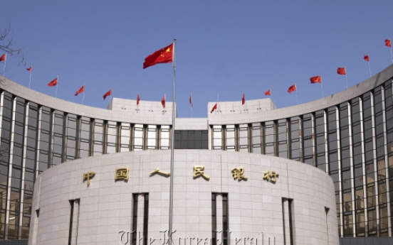 China says to cut bank reserves