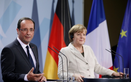 Merkel, Hollande say will keep eurozone together