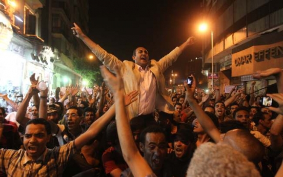 Egyptian runoff candidate’s HQ torched in Cairo