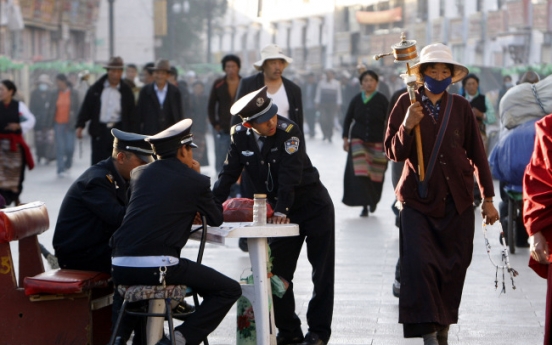 China detains hundreds in Tibet capital