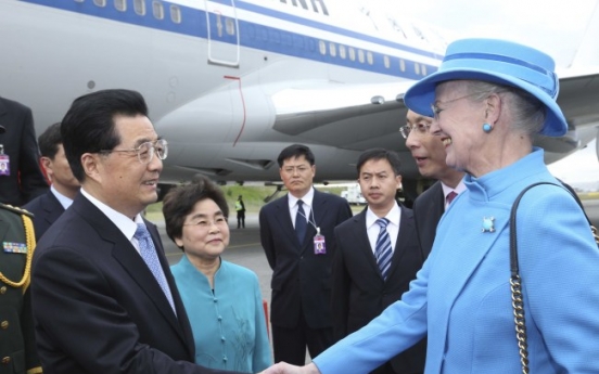 Hu arrives in Denmark for landmark visit