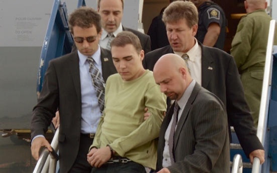 Suspect in body parts case returns to Canada