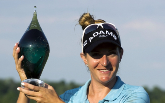 Lang endures playoff for 1st LPGA title