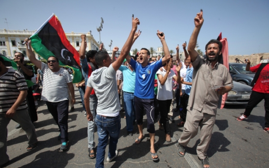 Libyans in historic vote amid tensions