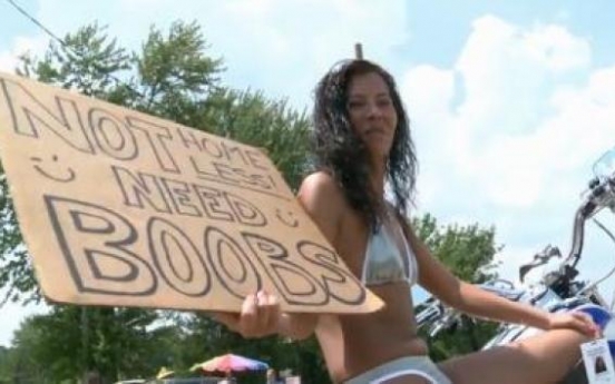 Panhandler seeks money for boob job