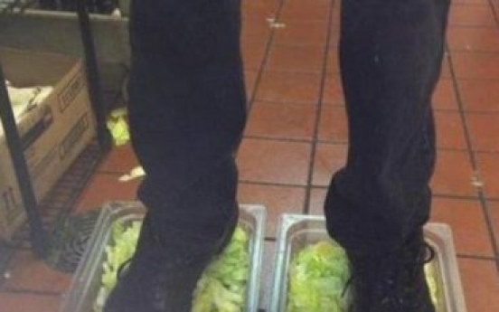 Workers fired over lettuce standing pic