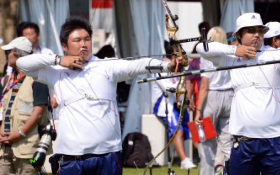 Archers begin chase for gold on opening day of London Olympics