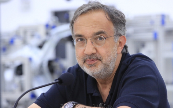 VW calls for Marchionne to quit as head of auto group