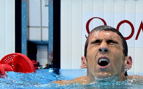 Michael Phelps aims for redemption in 200 fly