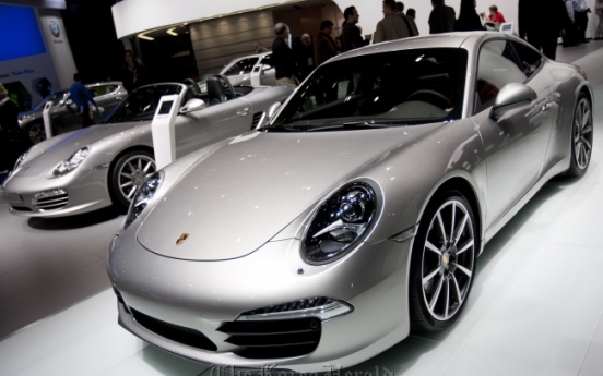 VW completes purchase of Porsche