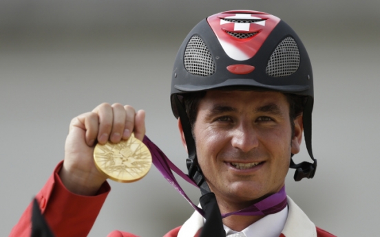 Swiss end 88-year wait for show jumping gold