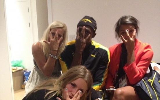 Usain Bolt enjoys midnight party with Swedish female athletes after 100m win