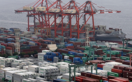 Japan swings to trade deficit as exports sink