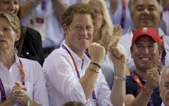 Britons shrug off nude photos of Prince Harry