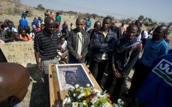 S. Africa prosecutor to withdraw murder charges against miners