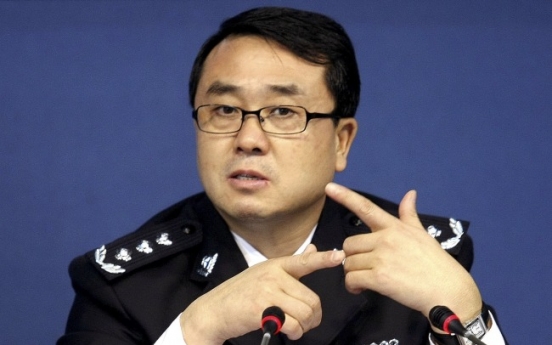 Ex-police chief charged in China political scandal