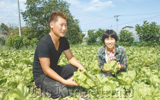 Young couple keeps farming alive in Fukushima Prefecture