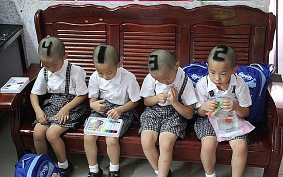 Mom shaves quadruplets’ heads to tell them apart