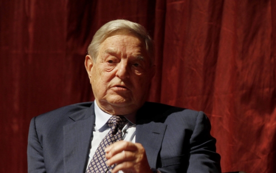 Germany risks recession by enforcing euro austerity: Soros