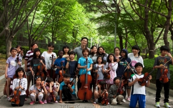 Violist leads orchestra of multicultural children